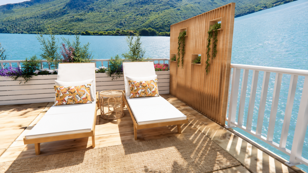 Aménagement d'une terrasse familiale en bord de lac avec espace repas, bains de soleil, végétation et coin jeux pour enfants.